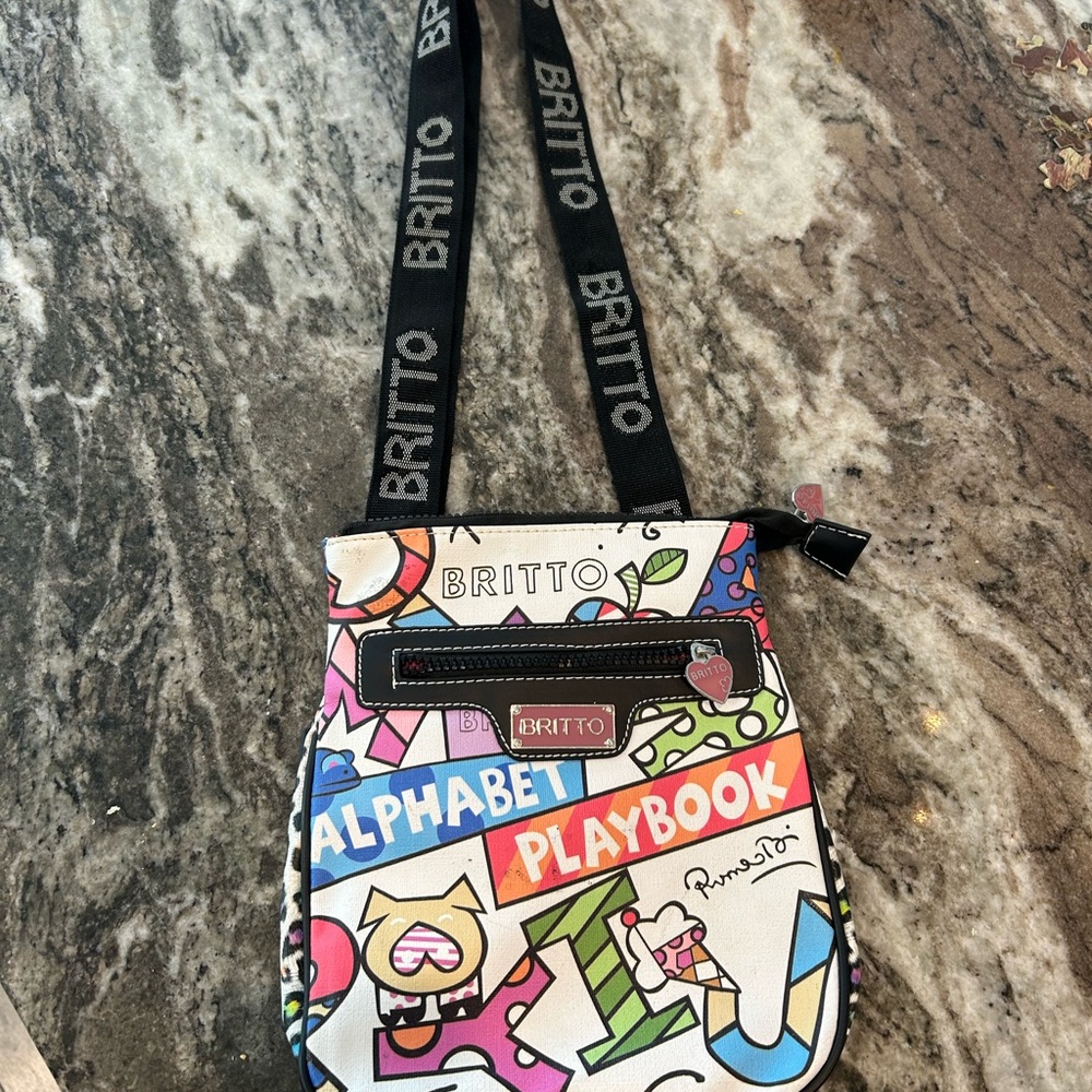 BRITTO Multicolor Alphabet Playbook Crossbody Bag has stains